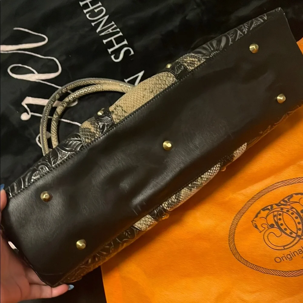 Sharif Embossed Leather Bag Intricate Detailing